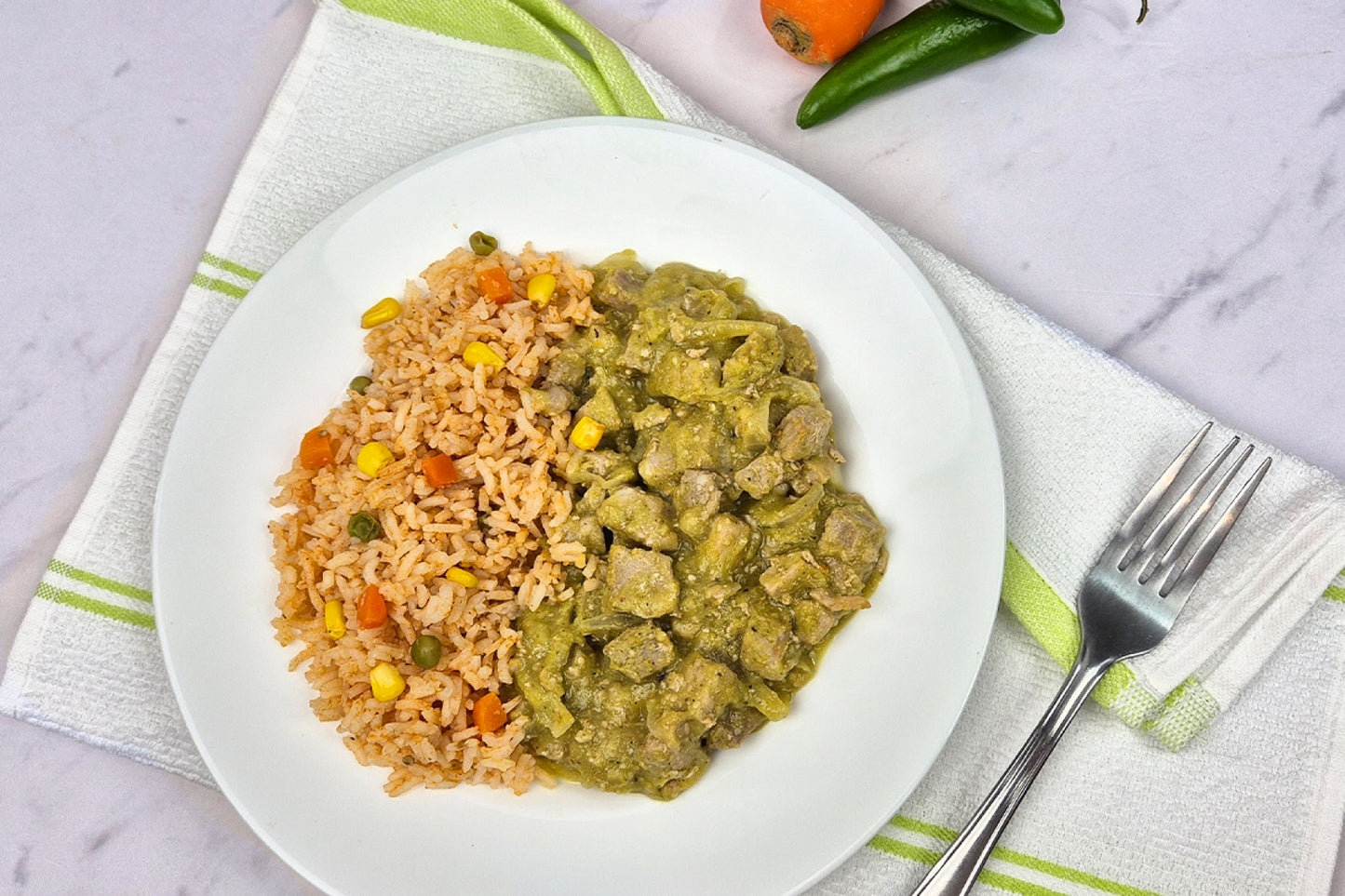 Cortadillo de cerdo en salsa verde con arroz a la mexicana