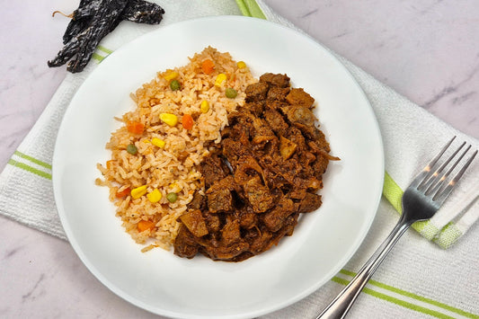 Res en salsa pasilla con arroz a la mexicana