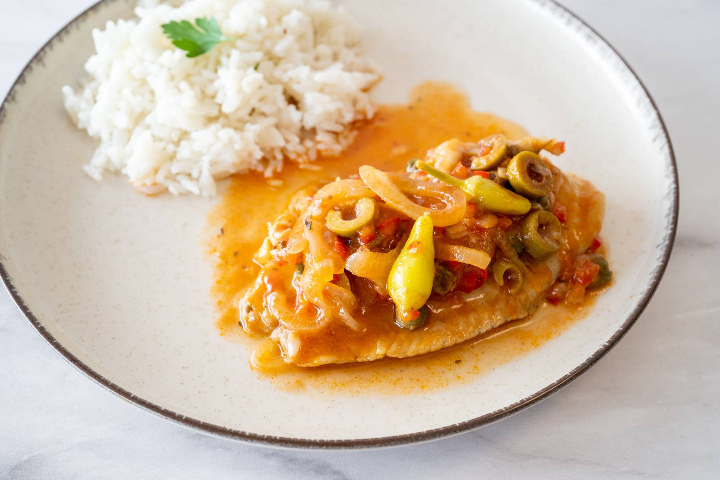 Pescado a la veracruzana con arroz